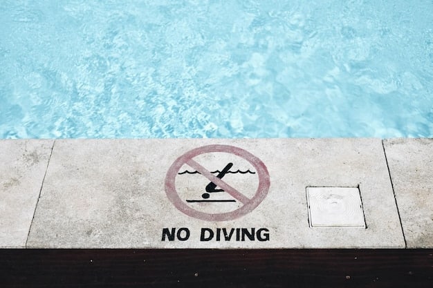 A clearly visible sign indicating water depth and a warning against diving, placed near a swimming pool.