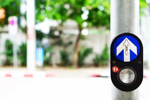An image showcasing an automated enforcement system camera discreetly mounted near a school zone crosswalk, accompanied by warning signs indicating the presence of automated enforcement.