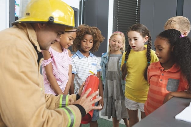 A group of elementary school students participating in a fire drill. They are lined up in an orderly fashion, being guided by teachers toward a designated exit. The faces of the children show a mix of concentration and seriousness.