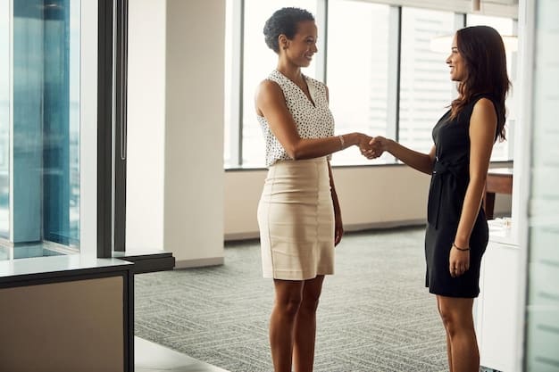 A close-up of a property manager shaking hands with a happy tenant in the lobby of an apartment building. Sunlight streams through the windows, creating a warm and inviting atmosphere, symbolizing a positive tenant-landlord relationship.