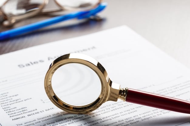 A close-up of a title insurance policy document with a magnifying glass over the section about covered risks, symbolizing the thorough examination and protection provided by title insurance.