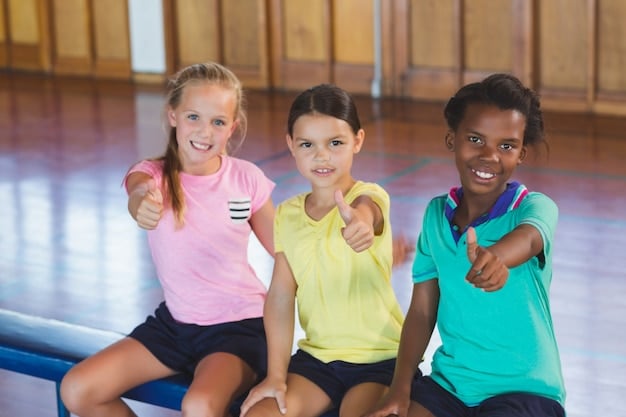 A group of kids participating in a sports clinic, learning basic athletic skills from volunteer coaches. The atmosphere is energetic and fun.