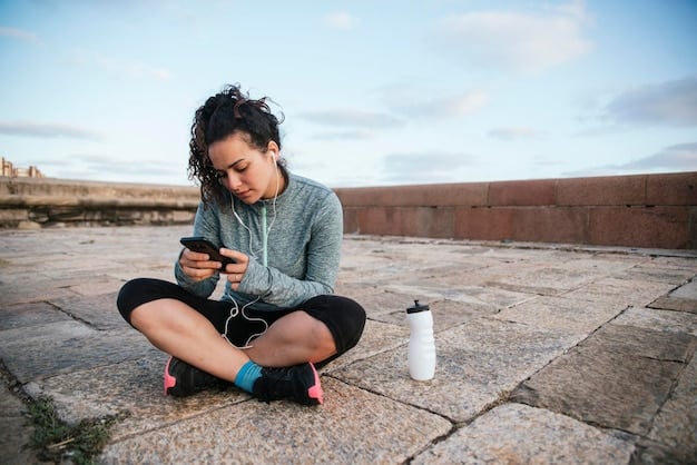 A young female athlete sitting on a bench, looking down with a distressed expression, while holding a phone with a social media feed showing victorious athletes.