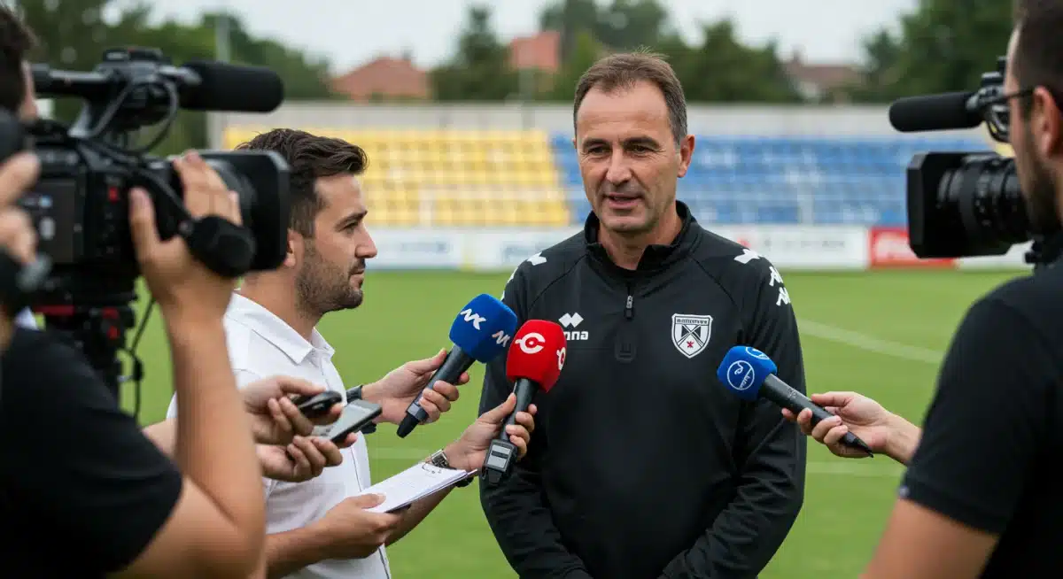 Periodista entrevistando a entrenador de equipo deportivo local